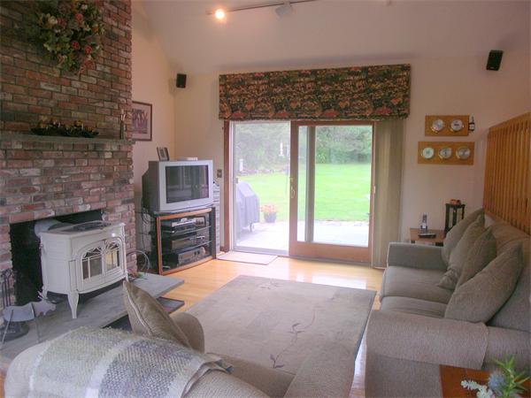 9 Garvey Road Framingham, MA 01701 - Photo 8 of 30 a bed room with a bed and a fireplace