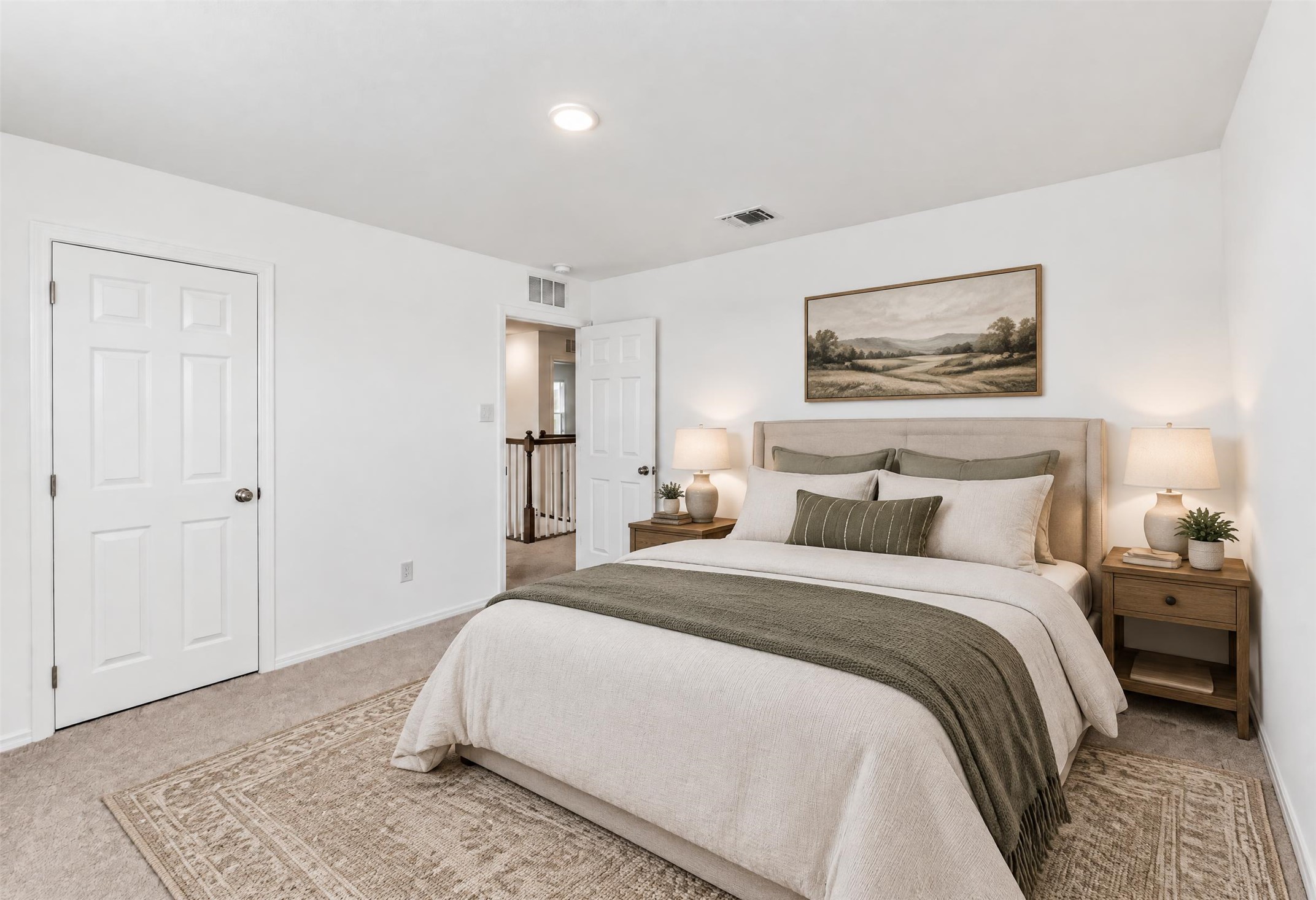 545 Henry Milton Road Georgetown, TX 78626 - Photo 21 of 33 Plush carpeting and recessed lighting create a comfortable atmosphere in this peaceful bedroom.