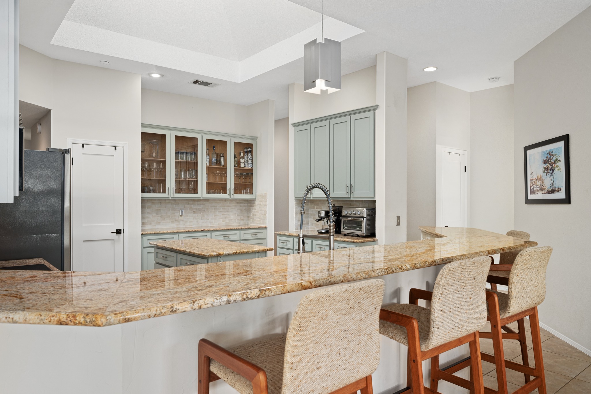 7601 Ponoma Trail Austin, TX 78749 - Photo 16 of 38 a kitchen with granite countertop a sink and cabinets