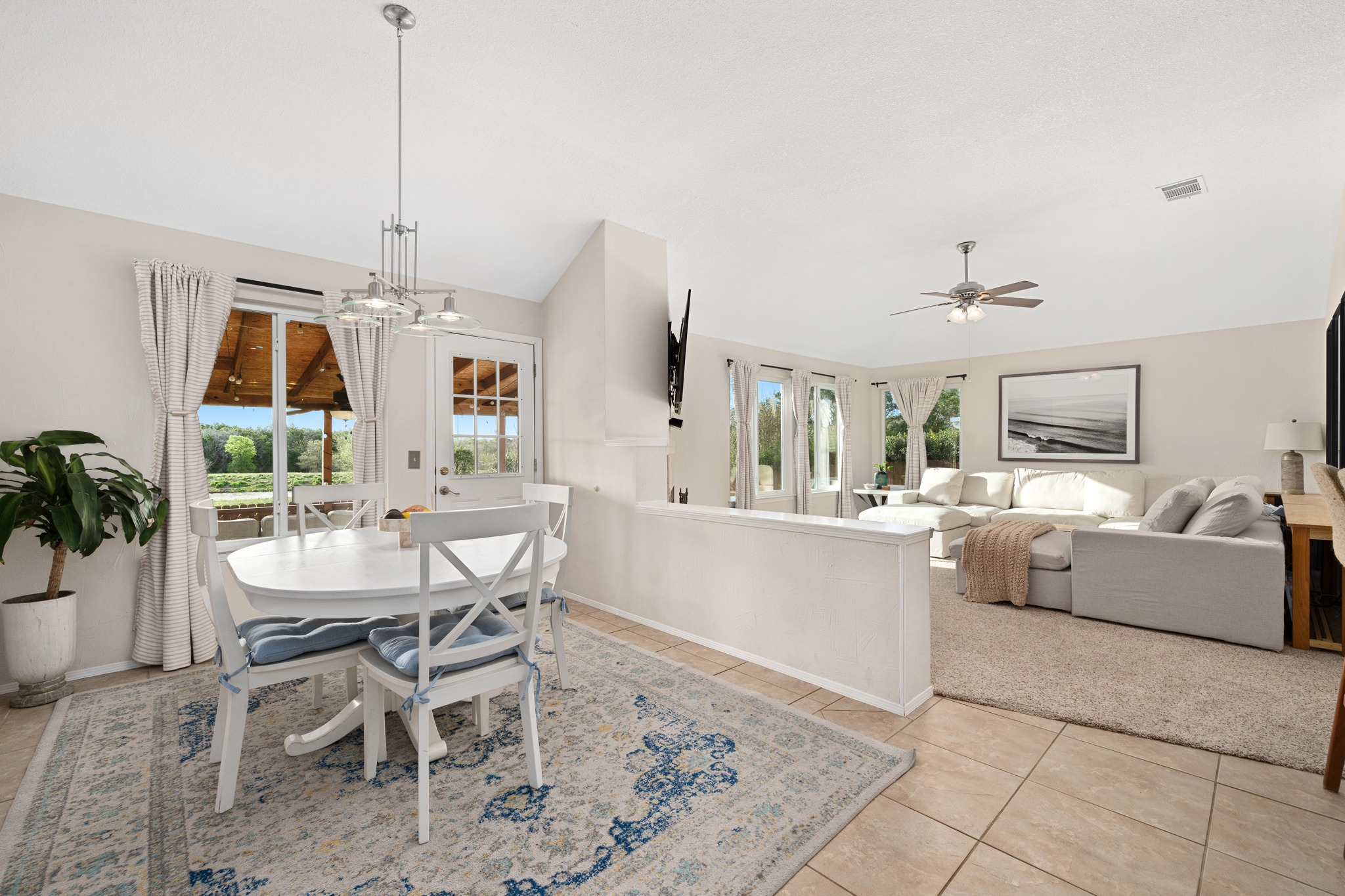 7601 Ponoma Trail Austin, TX 78749 - Photo 18 of 38 a dining room with furniture and chandelier