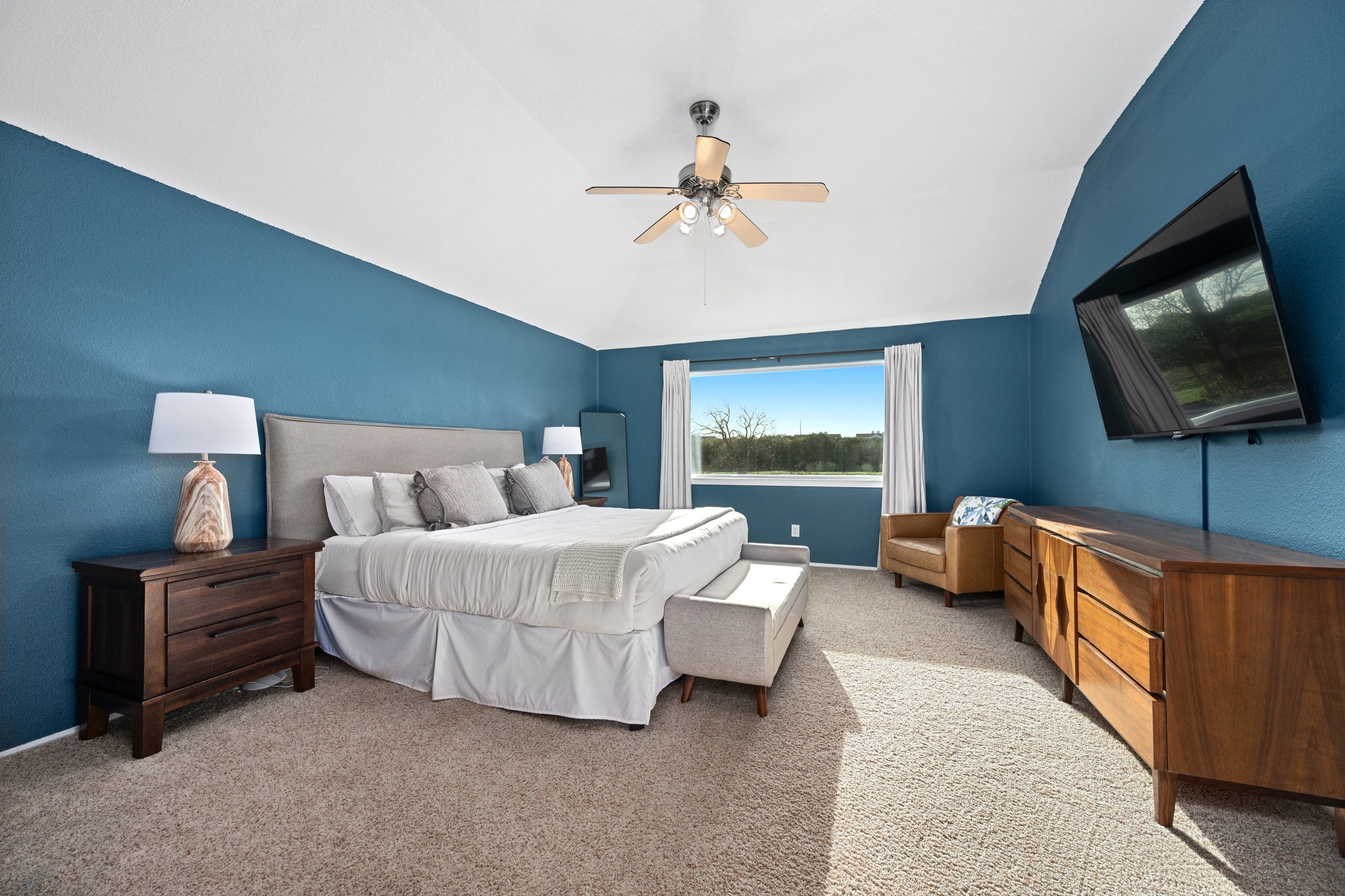 7601 Ponoma Trail Austin, TX 78749 - Photo 22 of 38 a bedroom with bed and a flat screen tv