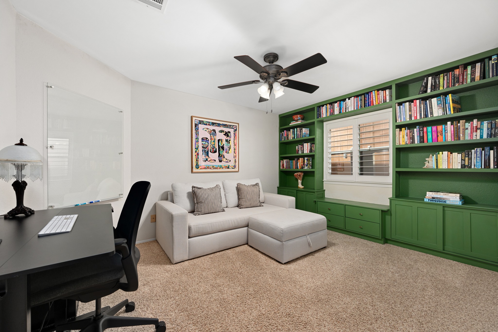 7601 Ponoma Trail Austin, TX 78749 - Photo 29 of 38 a living room with furniture and a book shelf
