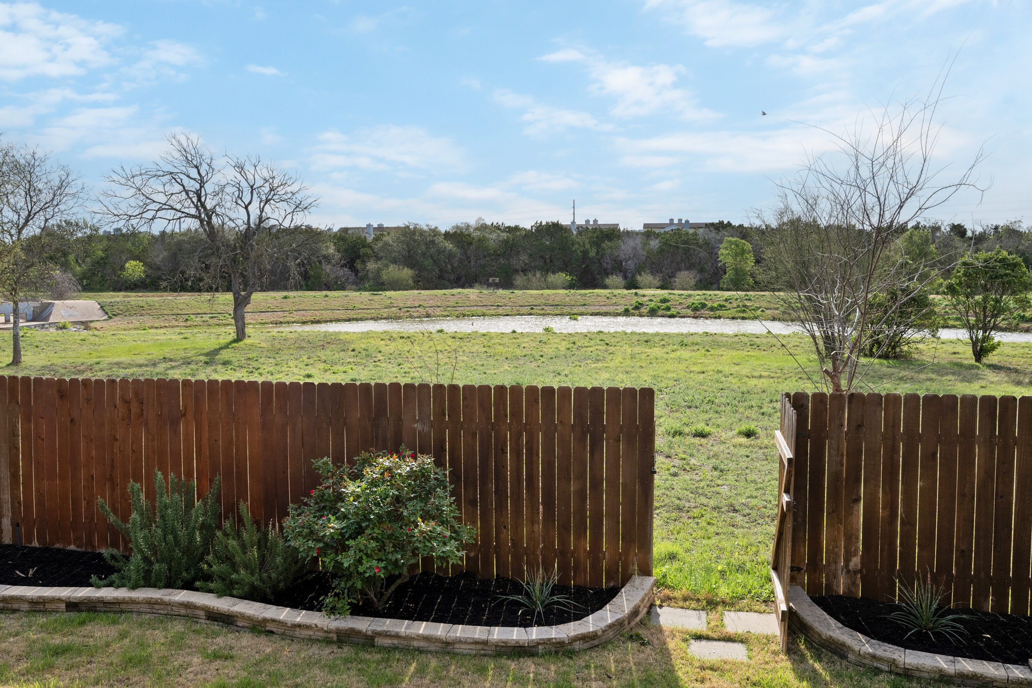 7601 Ponoma Trail Austin, TX 78749 - Photo 36 of 38 a view of a swimming pool and a yard