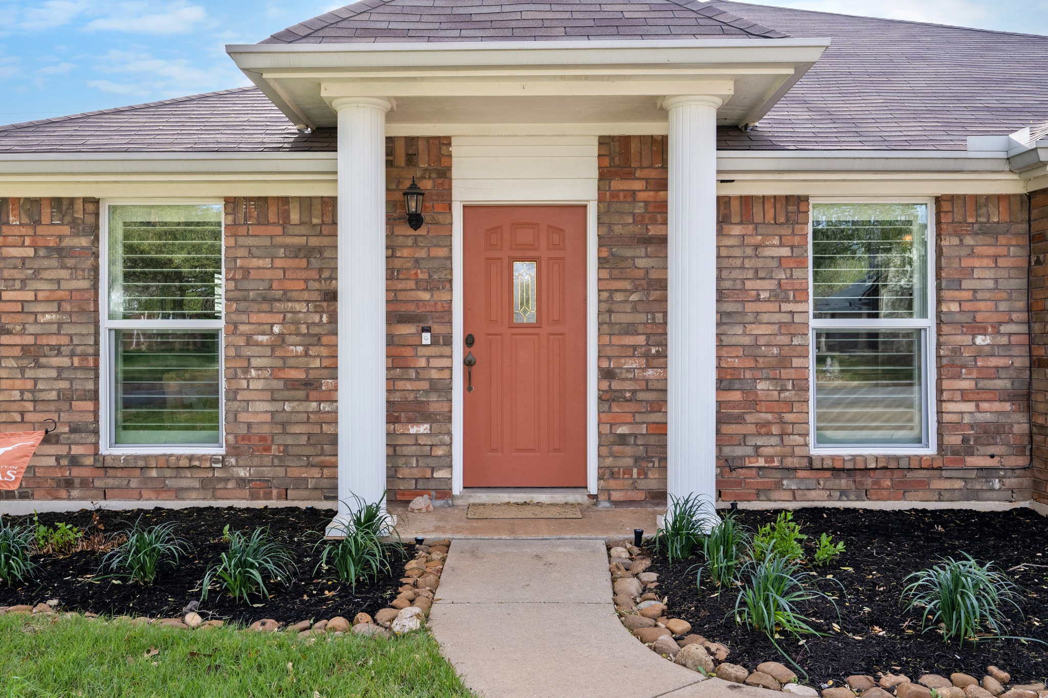 7601 Ponoma Trail Austin, TX 78749 - Photo 6 of 38 a front view of a house with a yard