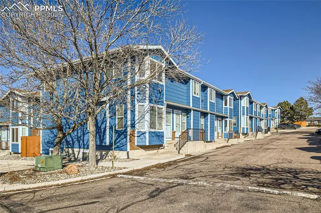 a view of a building with a road