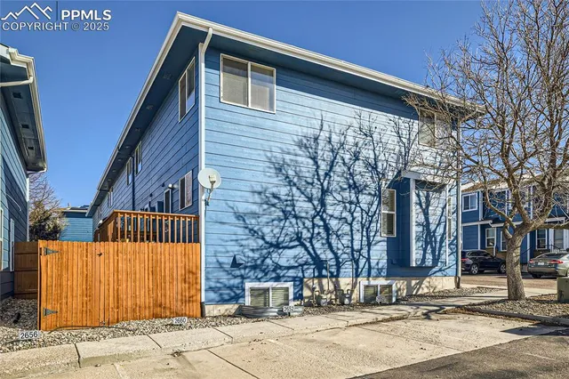 a view of a building with a street