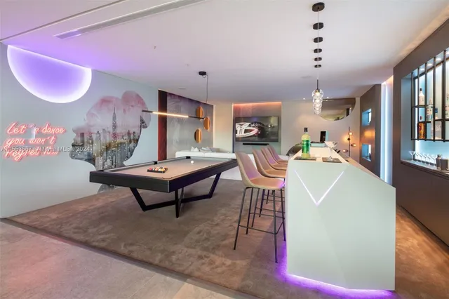 a view of a chairs and table in the patio