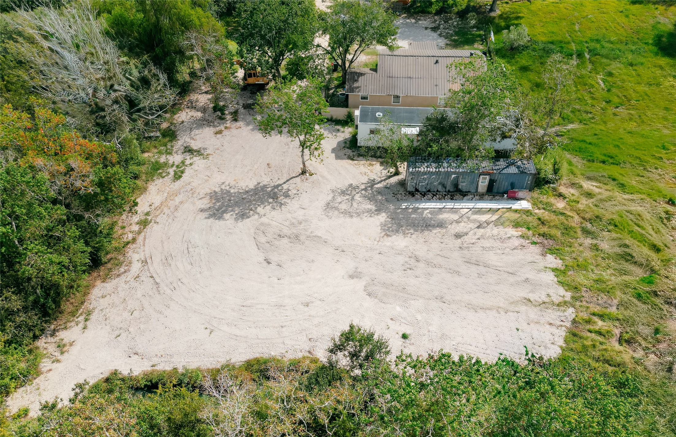 12731 Wanda Way Rosharon, TX 77583 - Photo 15 of 15 an aerial view of a house with a yard and large trees
