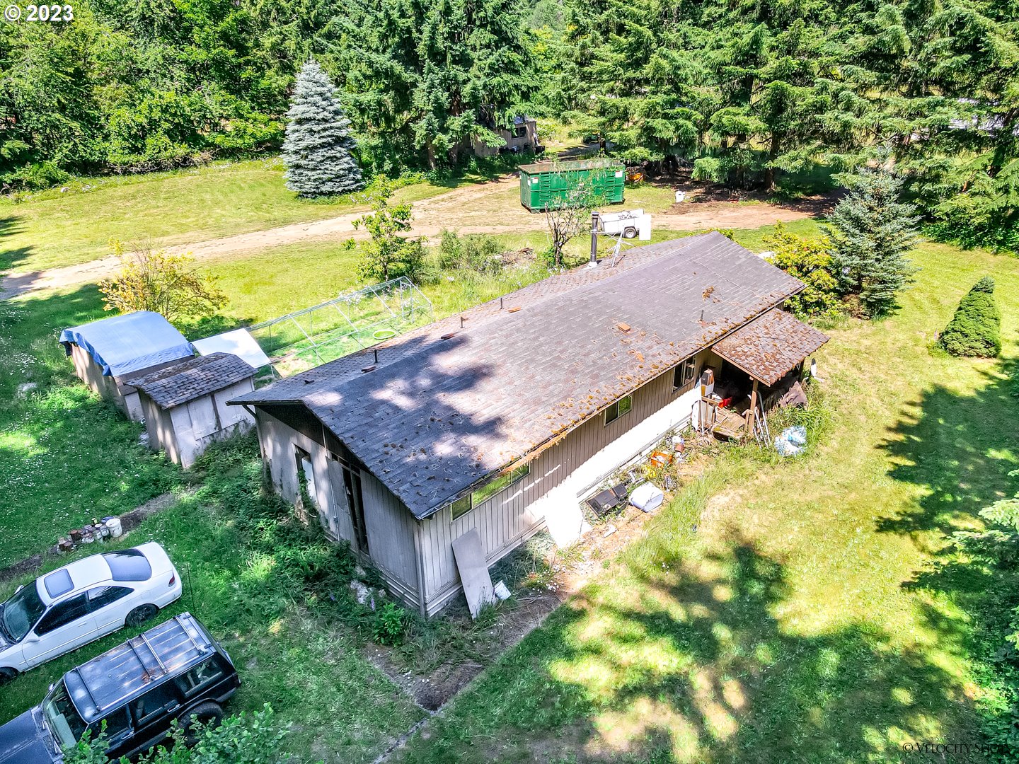 38971 Southeast Rude Road Sandy, OR 97055 - Photo 25 of 46 an aerial view of a house with a garden and swimming pool