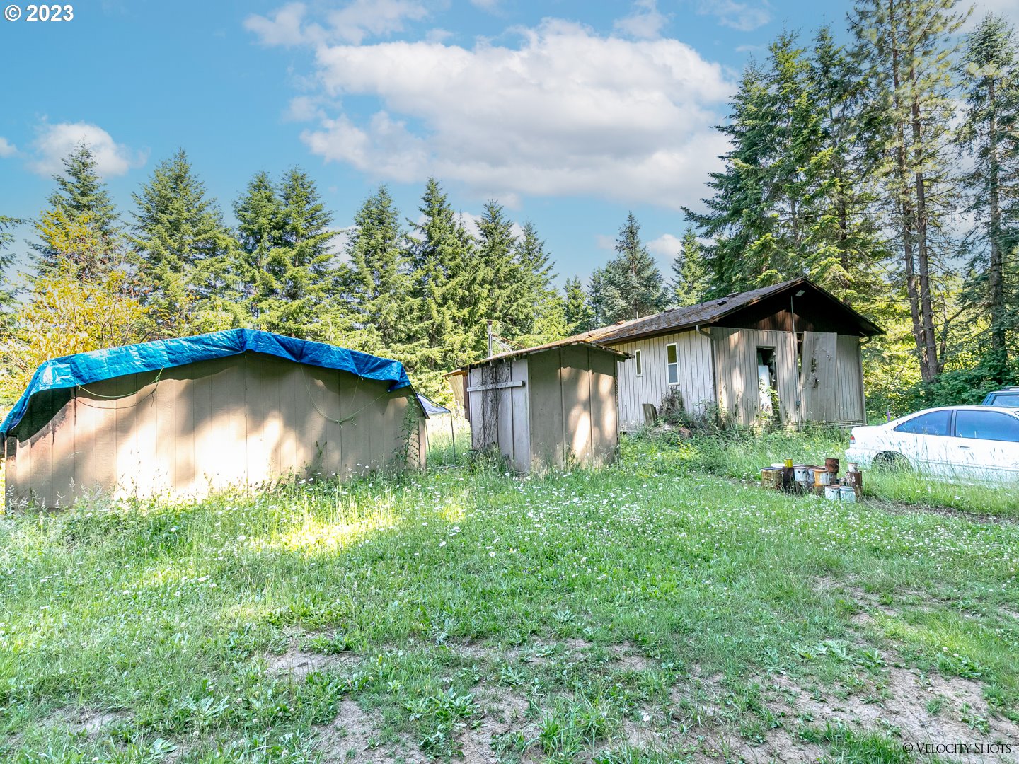 38971 Southeast Rude Road Sandy, OR 97055 - Photo 29 of 46 a backyard of a house with table and chairs