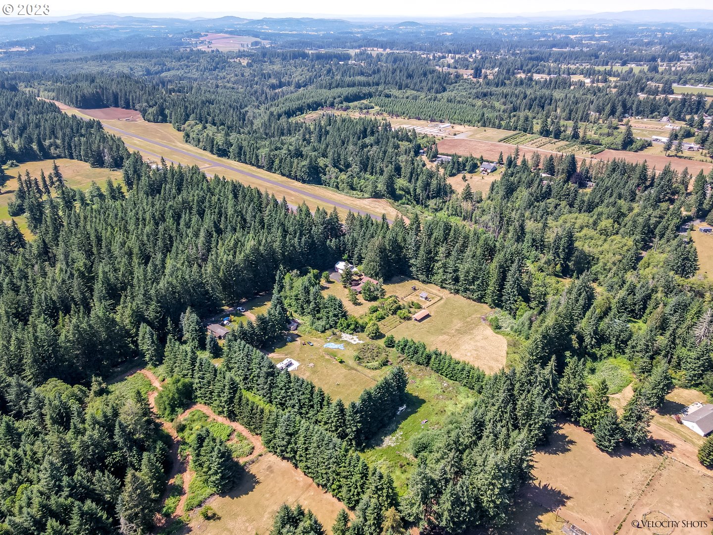 38971 Southeast Rude Road Sandy, OR 97055 - Photo 34 of 46 an aerial view of a house with a yard and lake view