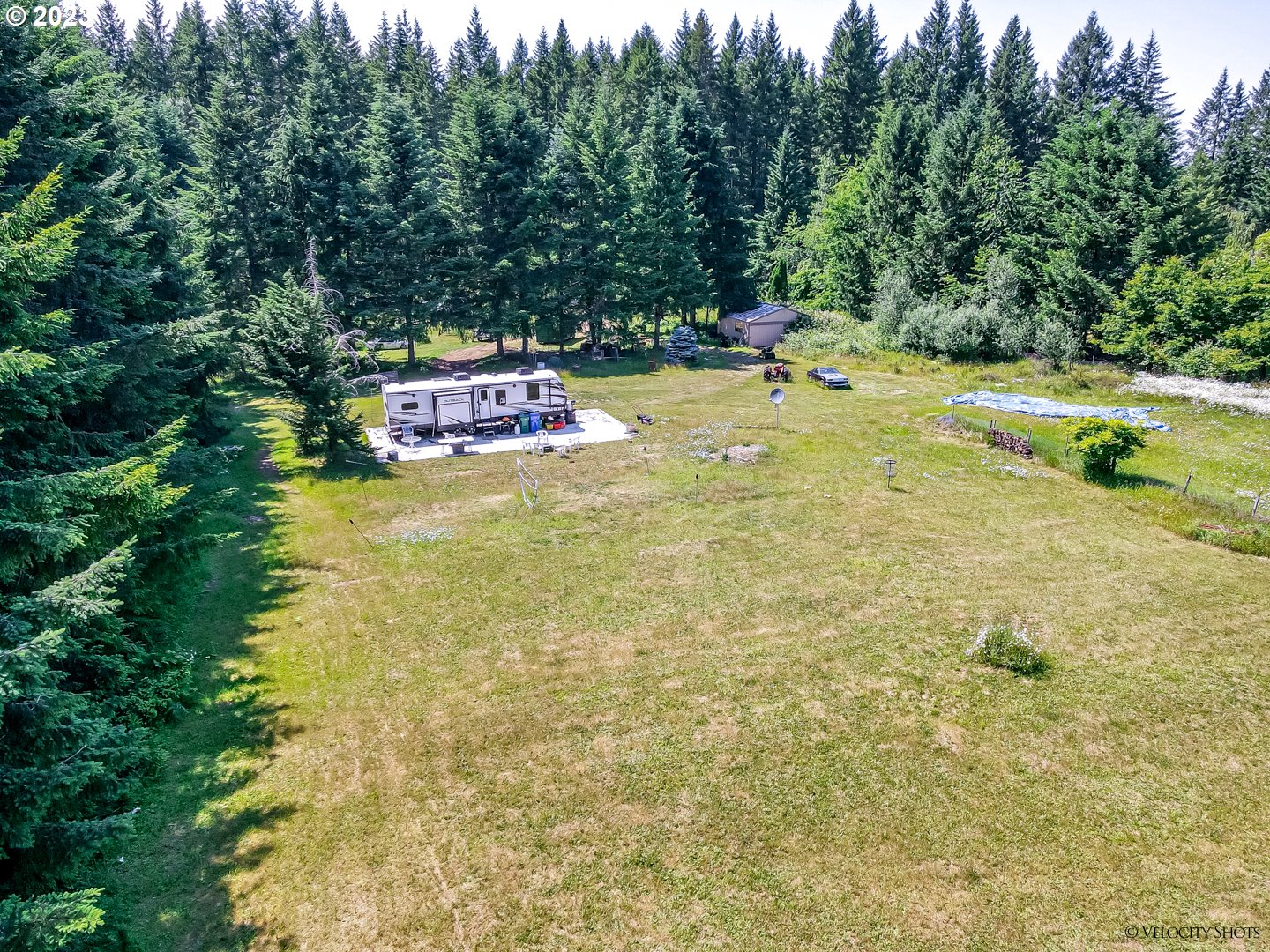 38971 Southeast Rude Road Sandy, OR 97055 - Photo 40 of 46 a backyard of a house with table and chairs