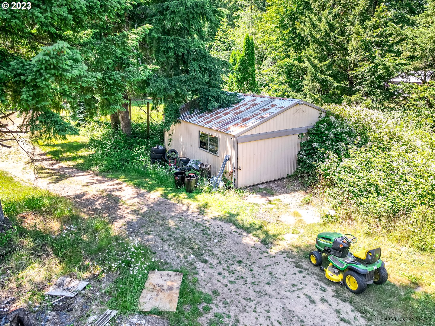 38971 Southeast Rude Road Sandy, OR 97055 - Photo 42 of 46 a view of a house with a yard and sitting area