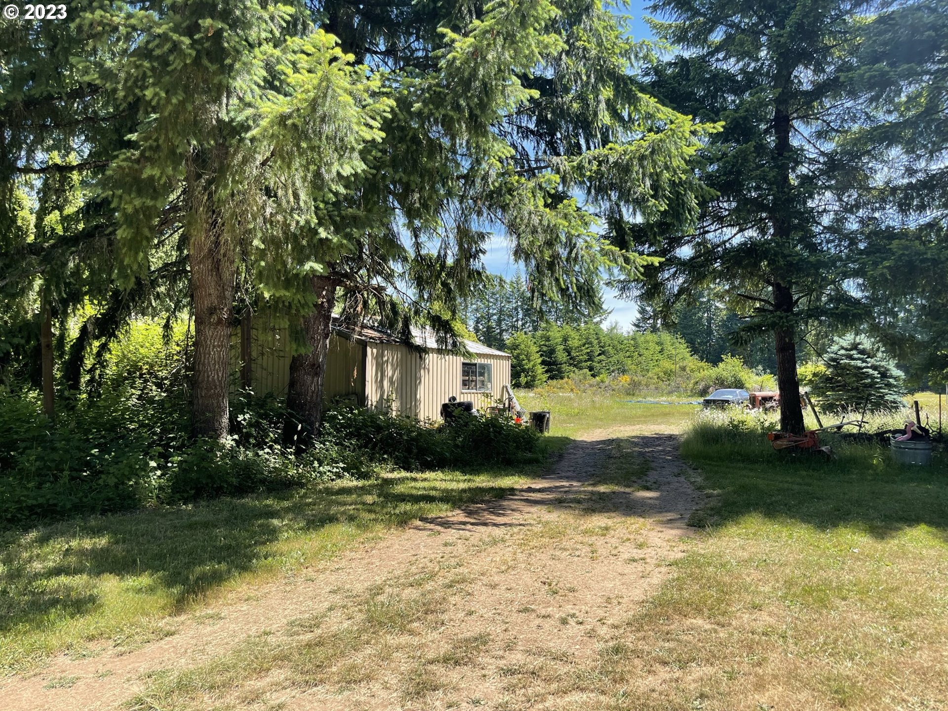38971 Southeast Rude Road Sandy, OR 97055 - Photo 5 of 46 a view of a house with a yard