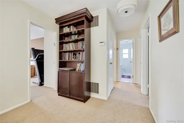a view of living room with furniture and a window