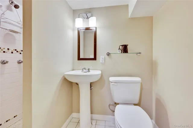 a view of a deck with wooden floor and a yard