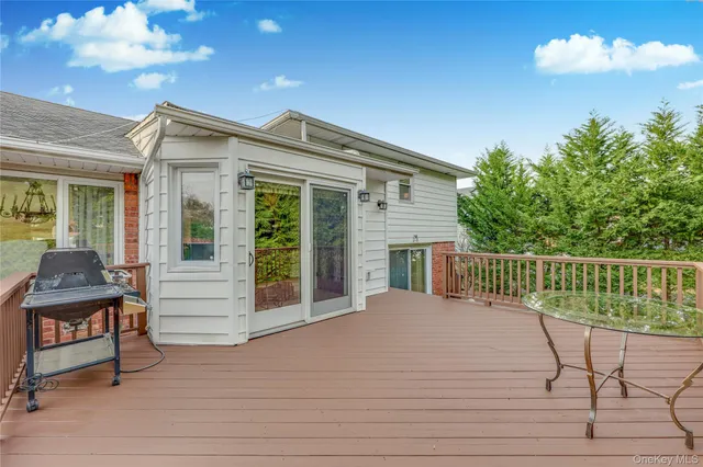 a view of backyard with deck