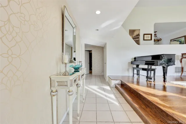 a living room with furniture and a table