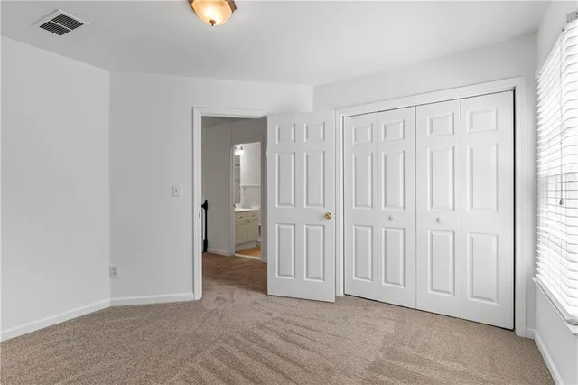 an empty room with window