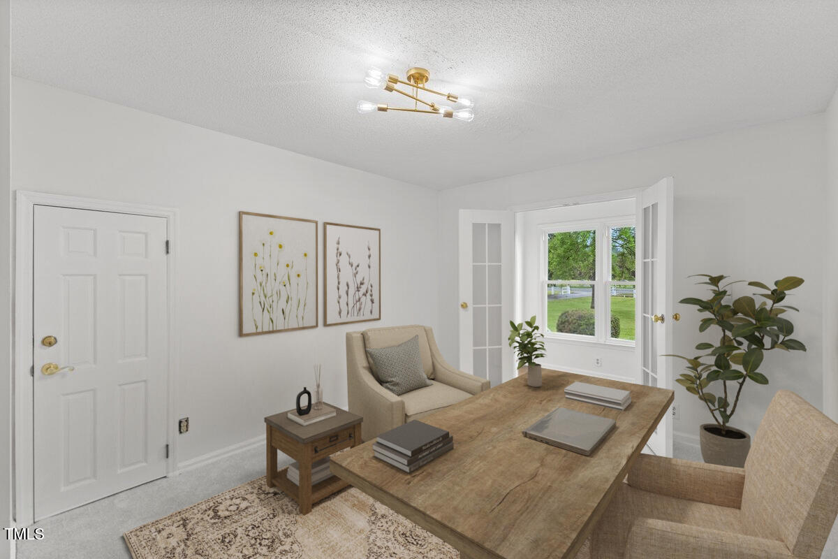 314 Lane Road Dunn, NC 28334 - Photo 13 of 68 a living room with furniture flowerpot and a window