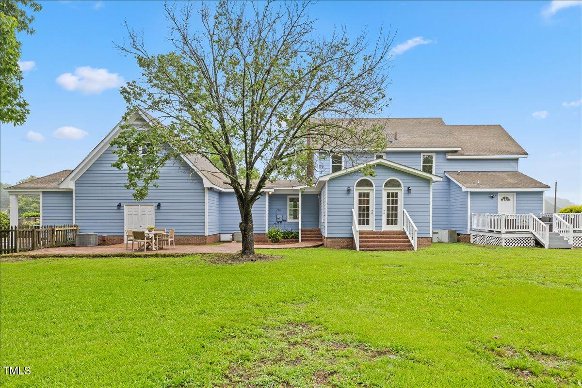314 Lane Road Dunn, NC 28334 - Photo 65 of 68 a front view of house with yard