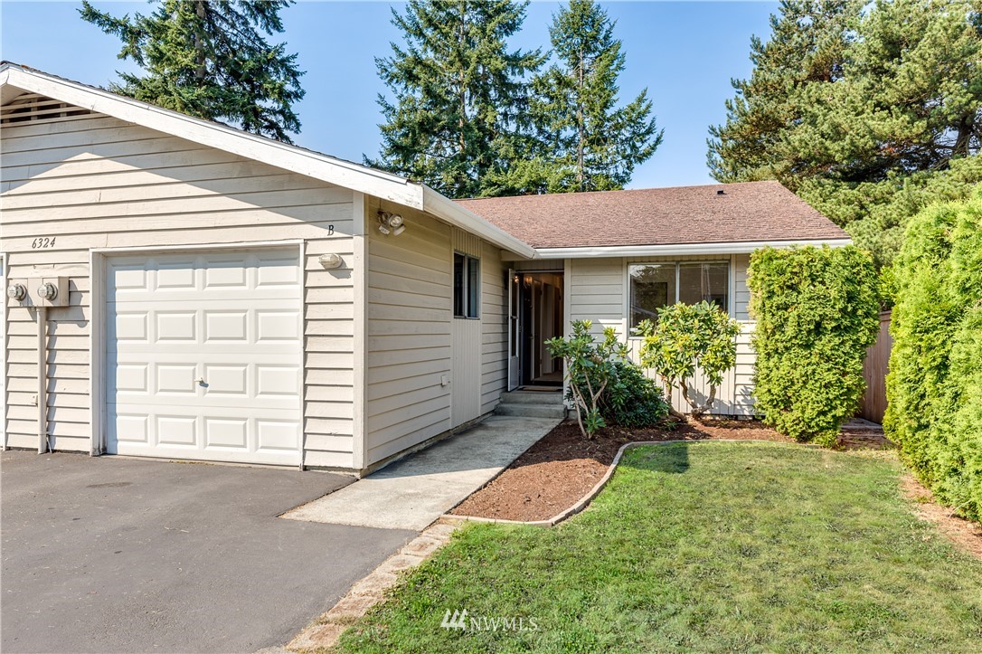 6324 Cady Road, Unit B Everett, WA 98203 - Photo 1 of 22 a view of a house with a yard