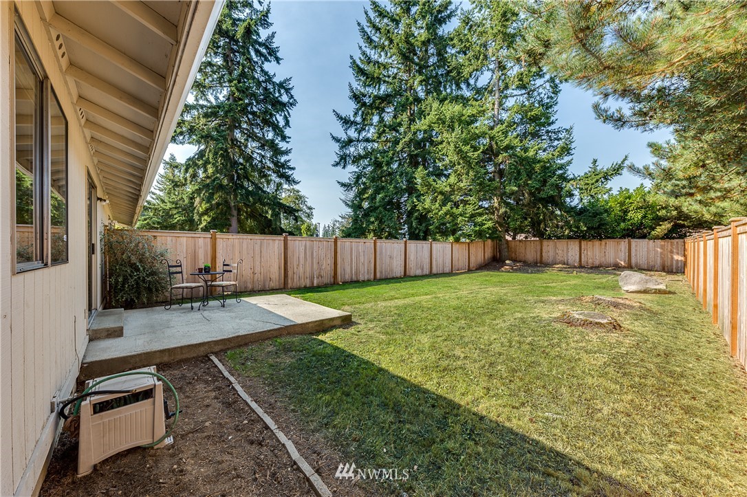 6324 Cady Road, Unit B Everett, WA 98203 - Photo 3 of 22 a view of a backyard with a swing