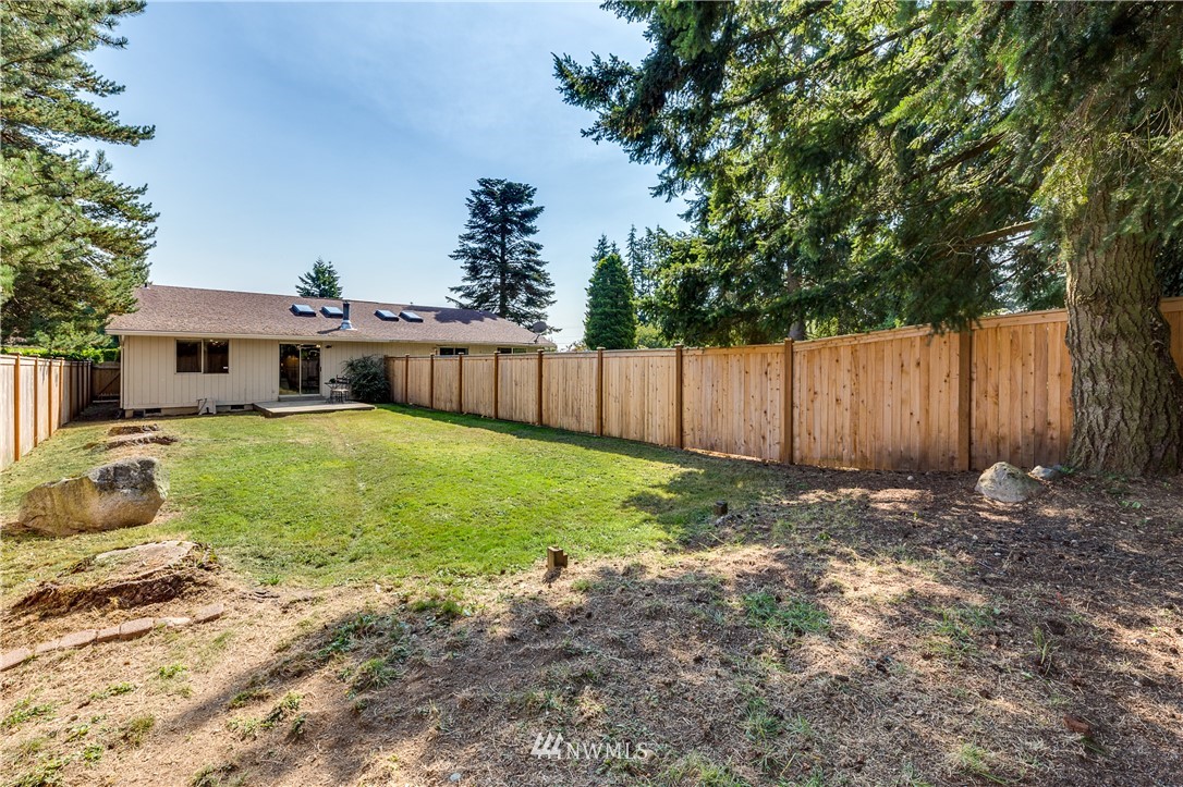 6324 Cady Road, Unit B Everett, WA 98203 - Photo 4 of 22 a view of a house with backyard and sitting area