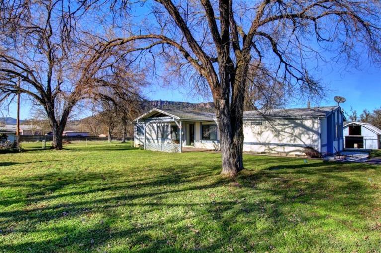 8085 High Banks Road Central Point, OR 97502 - Photo 33 of 35 a view of a house with a yard