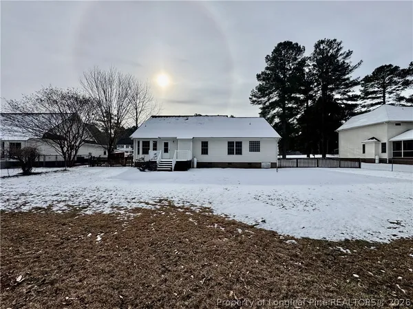 a view of large house with a yard