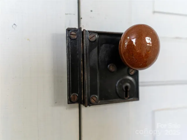 a view of a livingroom with furniture a chandelier