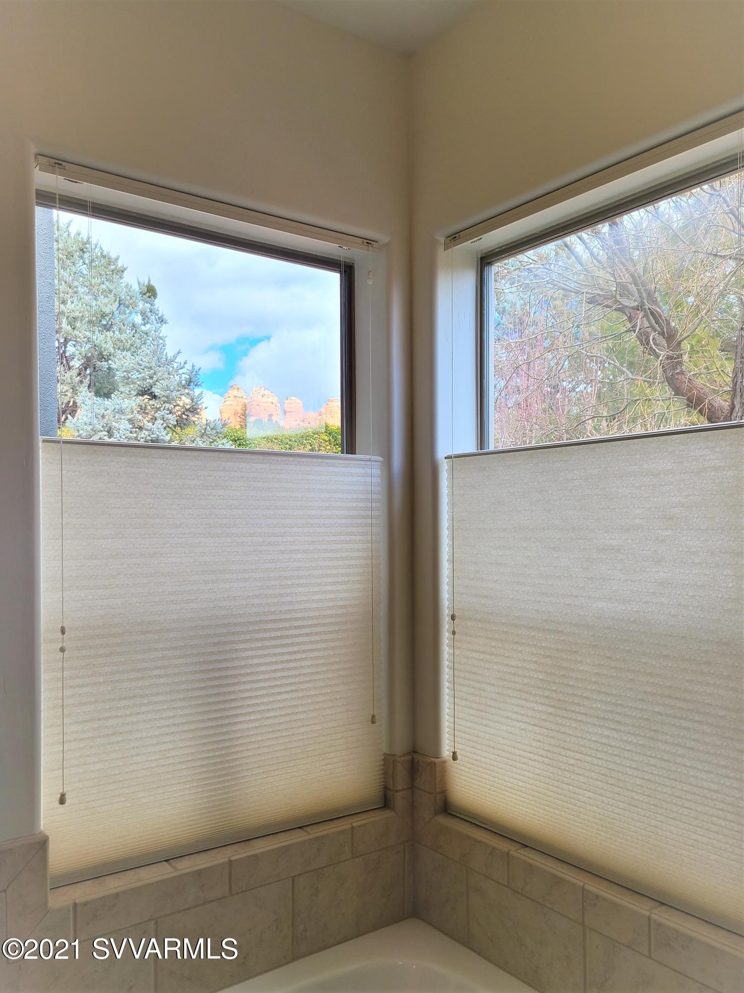 610 Rodeo Road Sedona, AZ 86336 - Photo 11 of 20 a bathroom with a window