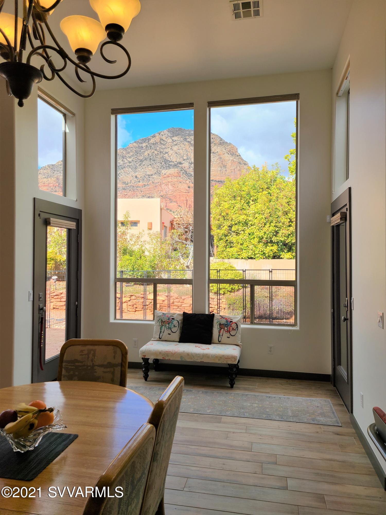 610 Rodeo Road Sedona, AZ 86336 - Photo 8 of 20 a living room with furniture and a large window