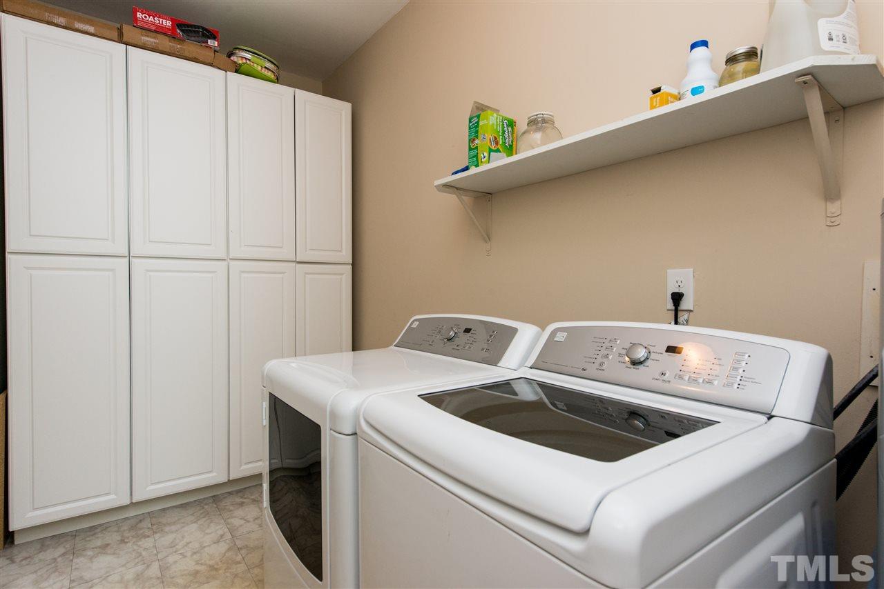 3512 Peach Haven Court Raleigh, NC 27607 - Photo 21 of 25 a utility room with dryer and washer