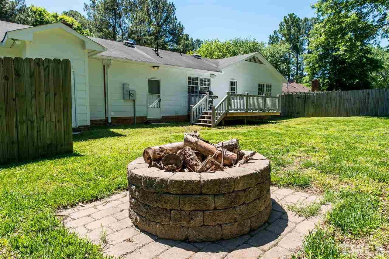 3512 Peach Haven Court Raleigh, NC 27607 - Photo 23 of 25 a view of a house with backyard and porch