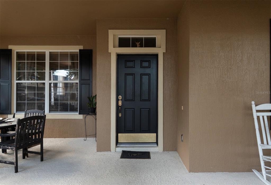 6673 Duncaster Street Windermere, FL 34786 - Photo 2 of 25 a view of a hallway with a outdoor space