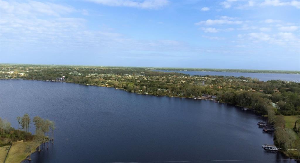6673 Duncaster Street Windermere, FL 34786 - Photo 22 of 25 an aerial view of residential building and lake view