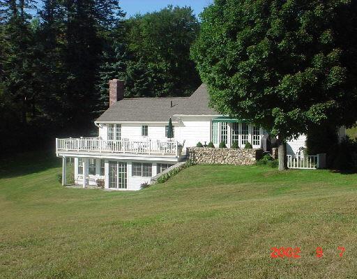 115 Squire Road Roxbury, CT 06783 - Photo 1 of 1 a front view of a house with garden