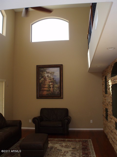 2933 East Blue Sage Road Gilbert, AZ 85297 - Photo 3 of 18 a view of a livingroom with furniture and a window