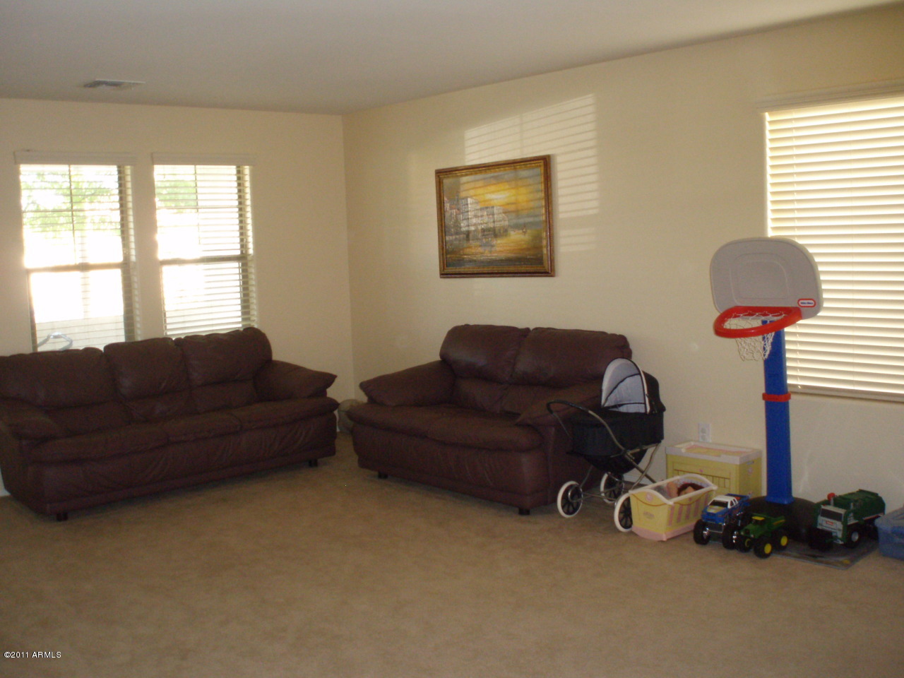 2933 East Blue Sage Road Gilbert, AZ 85297 - Photo 4 of 18 a living room with furniture and a window