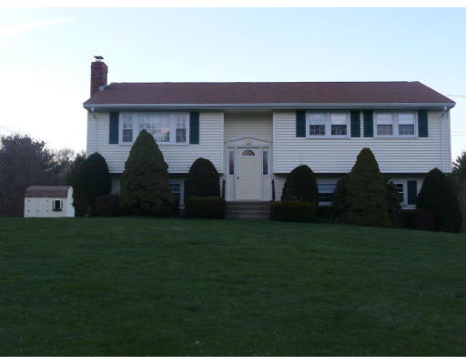 10 Winsor Road Billerica, MA 01821 - Photo 2 of 15 a front view of a house with a garden