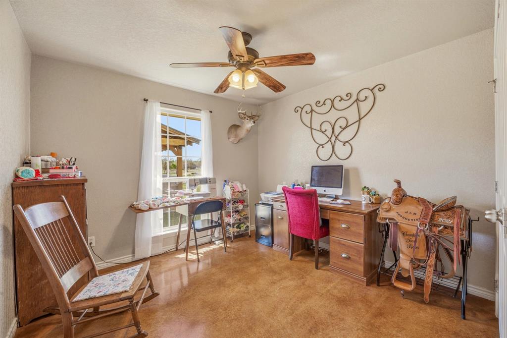 7915 East Fm 580 Kempner, TX 76539 - Photo 21 of 39 a living room with furniture and a chandelier