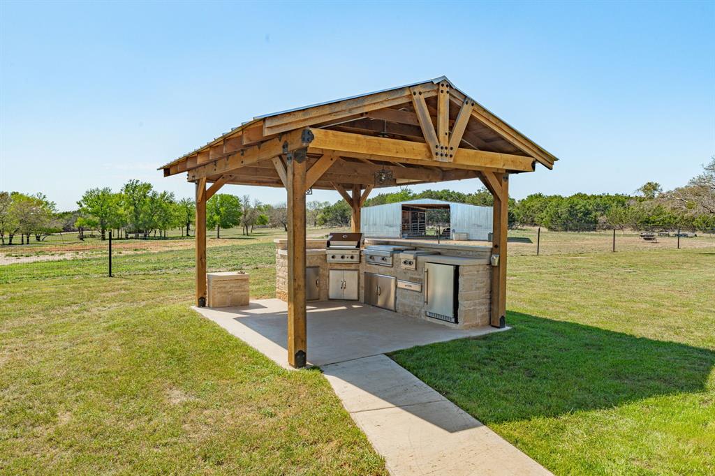 7915 East Fm 580 Kempner, TX 76539 - Photo 23 of 39 a view of a swimming pool with a garden