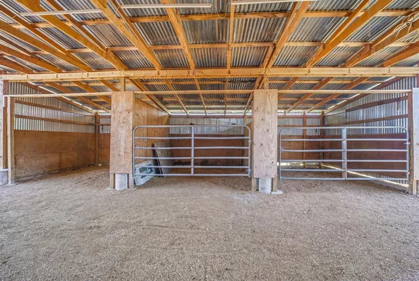 a view of a backyard with sitting area