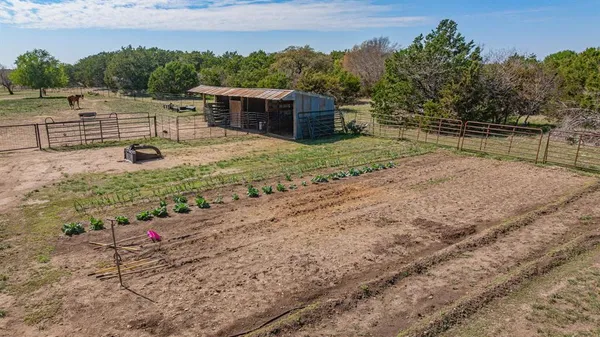 a view of a yard with an outdoor space