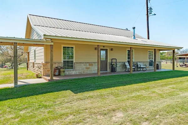 a view of a bedroom with furniture and garden