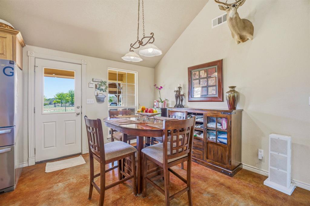 7915 East Fm 580 Kempner, TX 76539 - Photo 10 of 39 a view of a dining room with furniture and a chandelier