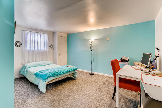 145 South Pinecrest Road Bolingbrook, IL 60440 - Photo 13 of 17 a room with a bed and a table in it