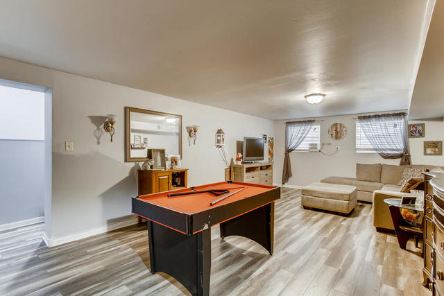 145 South Pinecrest Road Bolingbrook, IL 60440 - Photo 15 of 17 a living room with furniture and a table