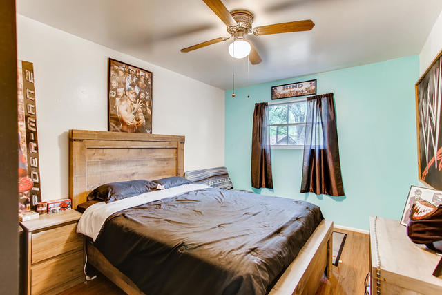 145 South Pinecrest Road Bolingbrook, IL 60440 - Photo 7 of 17 a bedroom with a bed and a flat screen tv